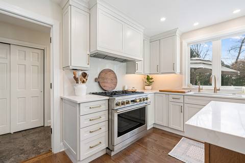 Transitional Kitchen with Custom Entertaining Features — photo 11