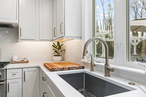 Transitional Kitchen with Custom Entertaining Features — photo 12