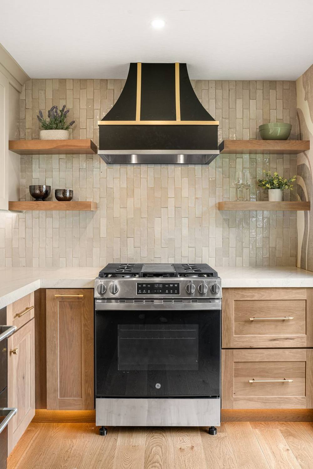 Kitchen Condo range, cooktop, and hood