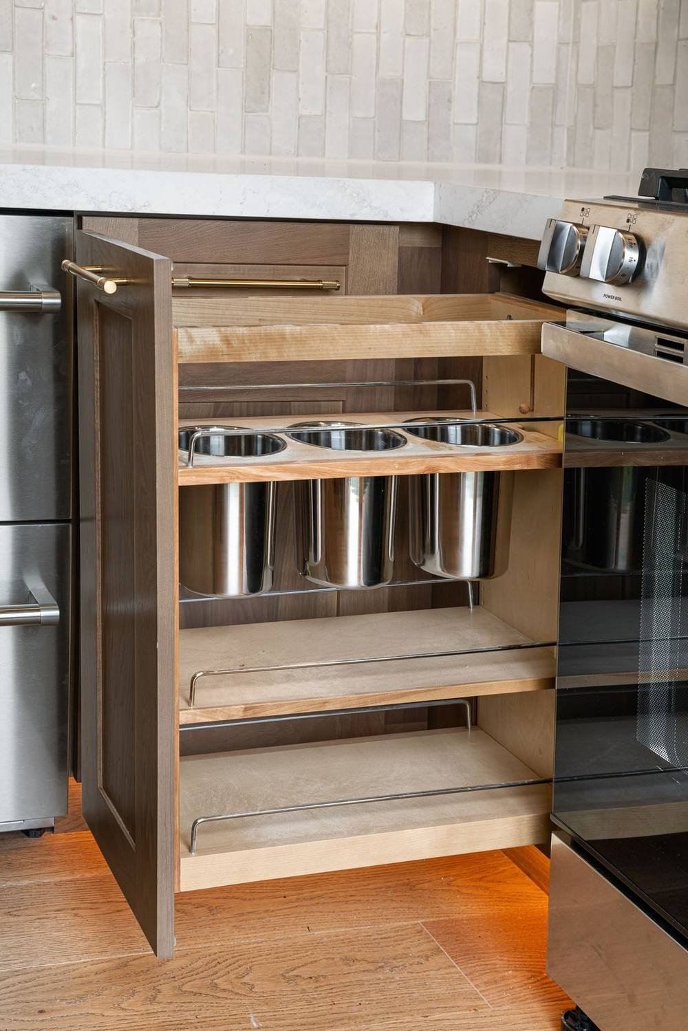 Kitchen Condo pull-out utensil storage detail